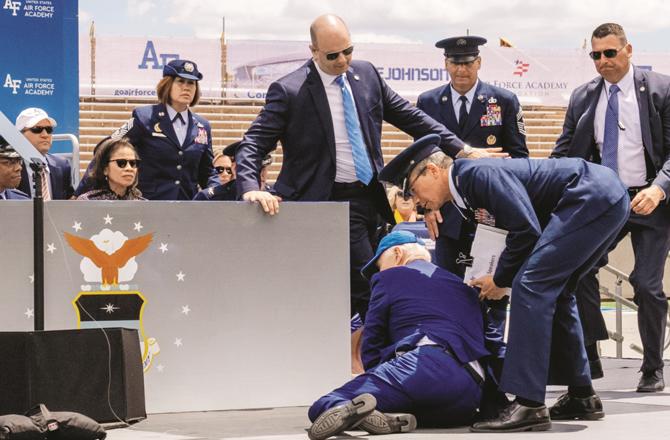 US President Joe Biden being picked up by security personnel. (Photo: PTI)